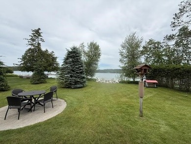 Located on Walloon Lakes' West arm, this property offers - photo 5