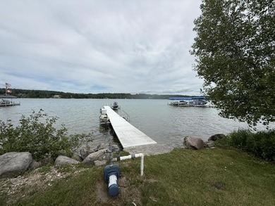 Located on Walloon Lakes' West arm, this property offers - photo 6