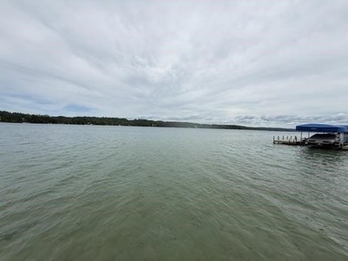 Located on Walloon Lakes' West arm, this property offers - photo 7