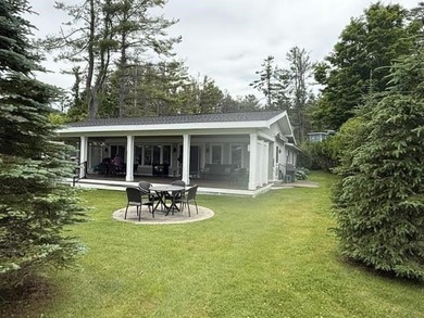 Located on Walloon Lakes' West arm, this property offers - photo 8