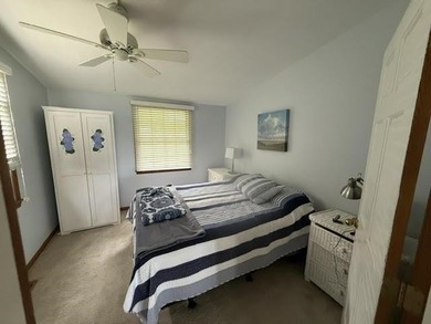 Located on Walloon Lakes' West arm, this property offers - photo 10
