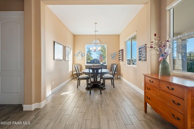 Set in the desirable Quailwood community, this impressive home