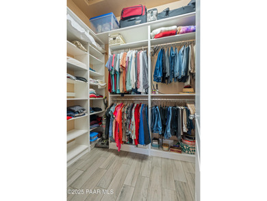 Set in the desirable Quailwood community, this impressive home