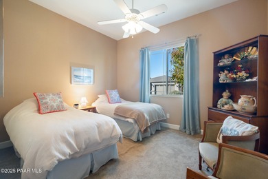 Set in the desirable Quailwood community, this impressive home