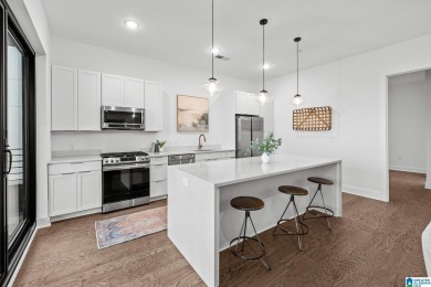 Experience the pinnacle of downtown Birmingham living in this