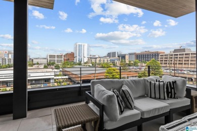 Experience the pinnacle of downtown Birmingham living in this