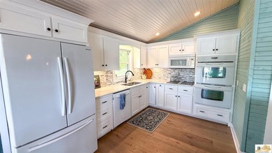 Experience luxury lake living at its finest in this stunning - photo 12