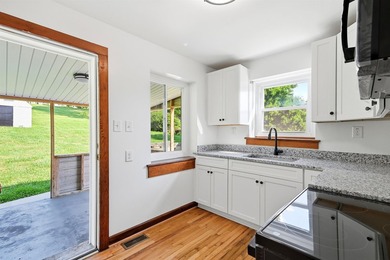 Filled w/ character & charm, this beautifully updated - photo 15