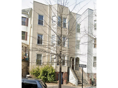 Prime opportunity to own a three-family property in the heart of - photo 1
