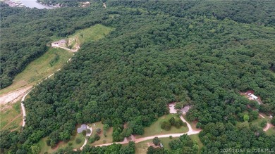 Beautiful 30 +/- acre property just minutes from Lake Ozark! The - photo 12