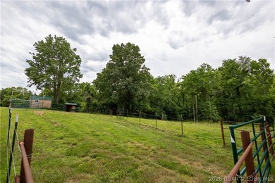 Beautiful 30 +/- acre property just minutes from Lake Ozark! The - photo 18