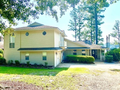 Lake Home For Sale in Carriere, Mississippi