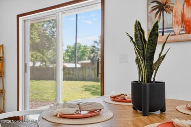Set on an oversized .46-acre lot with mature trees, this - photo 11
