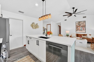 Set on an oversized .46-acre lot with mature trees, this - photo 14