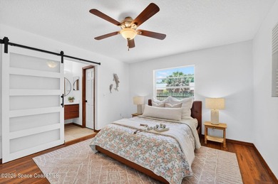 Set on an oversized .46-acre lot with mature trees, this - photo 15