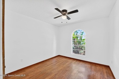 Set on an oversized .46-acre lot with mature trees, this - photo 19
