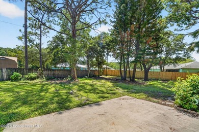 Set on an oversized .46-acre lot with mature trees, this - photo 24
