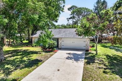 Set on an oversized .46-acre lot with mature trees, this - photo 27