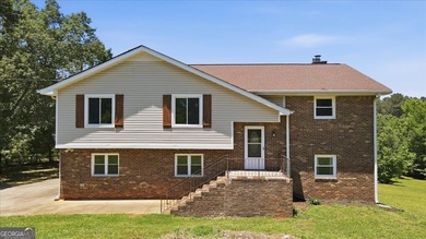 Nestled on 5 private acres with no HOA, this beautifully - photo 1