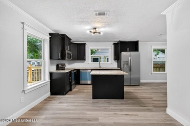 Completely remodeled and move-in ready! This home has been - photo 11