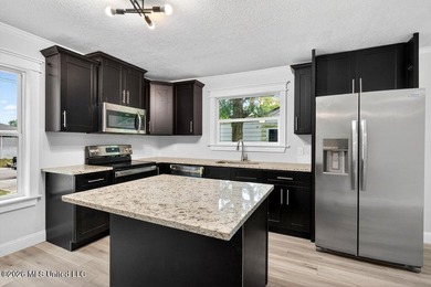 Completely remodeled and move-in ready! This home has been - photo 12