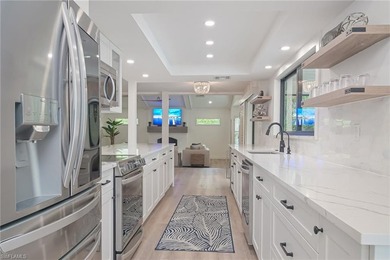 Discover an exceptional waterfront retreat in the highly - photo 12