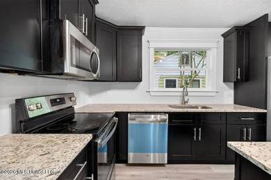 Completely remodeled and move-in ready! This home has been - photo 13