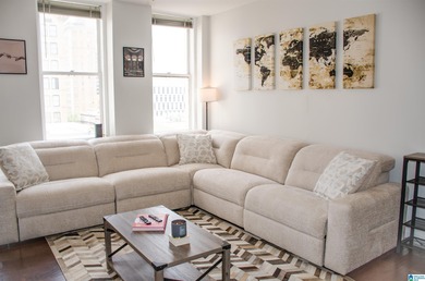 What a fabulous condo in the middle of the Loft District.  Walk