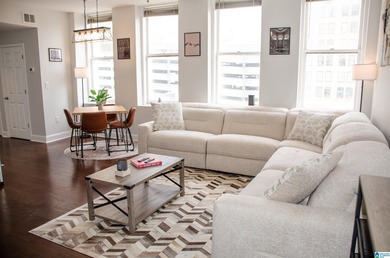 What a fabulous condo in the middle of the Loft District.  Walk