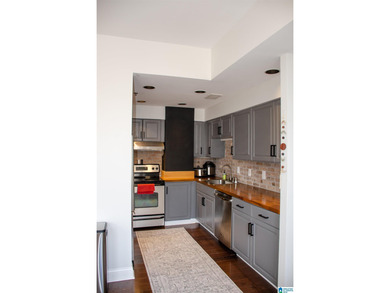 What a fabulous condo in the middle of the Loft District.  Walk