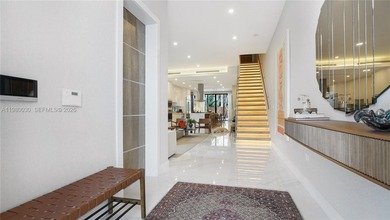 The home offers custom millwork and high-end finishes. Enjoy