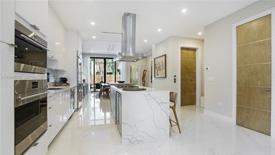 The home offers custom millwork and high-end finishes. Enjoy