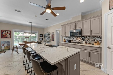 Nestled among mature trees and overlooking the 9th fairway, this - photo 11