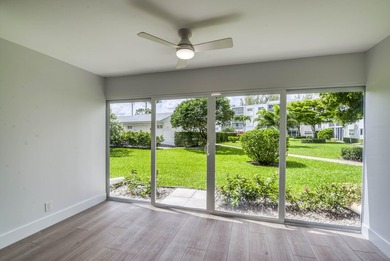 Experience curated luxury living in this sun-filled, completely - photo 11