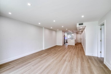 Experience curated luxury living in this sun-filled, completely - photo 15