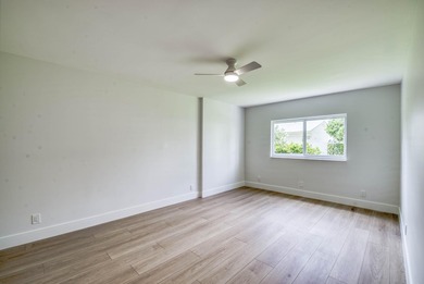Experience curated luxury living in this sun-filled, completely - photo 17