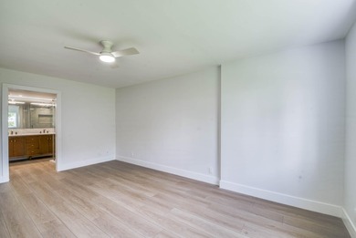 Experience curated luxury living in this sun-filled, completely - photo 18
