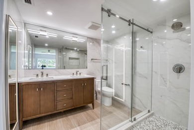 Experience curated luxury living in this sun-filled, completely - photo 19