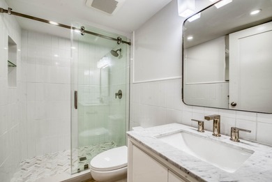 Experience curated luxury living in this sun-filled, completely - photo 22