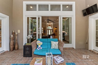 Nestled among mature trees and overlooking the 9th fairway, this - photo 25