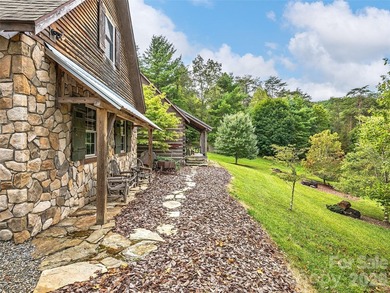 Welcome to this highly acclaimed, custom log home nestled on 13 - photo 20