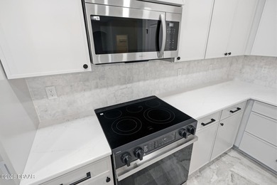 Enjoy spacious living with 10-foot ceilings and a bright, open - photo 41