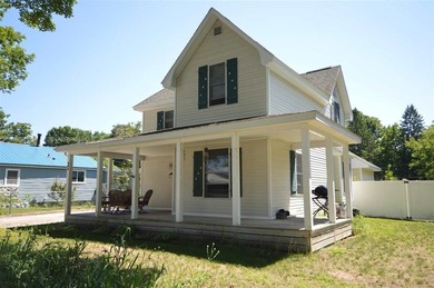 Imagine yourself in beautiful Boyne City, setting on your - photo 1