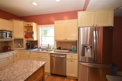 Imagine yourself in beautiful Boyne City, setting on your - photo 3