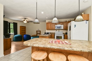Discover the charm of Ozark living in this unique berm home just - photo 50
