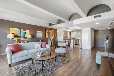 Striking mid-century modern 2 bed, 2 bath condo located at The