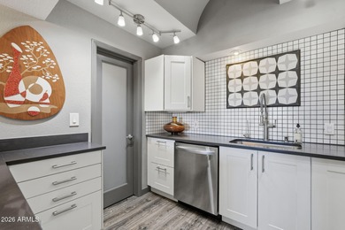 Striking mid-century modern 2 bed, 2 bath condo located at The