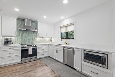 Welcome to 99 Country Club Dr. W, an elegantly updated - photo 30