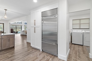Welcome to 99 Country Club Dr. W, an elegantly updated - photo 33