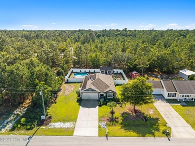 This immaculate, one-level coastal home sits on an oversized lot - photo 3